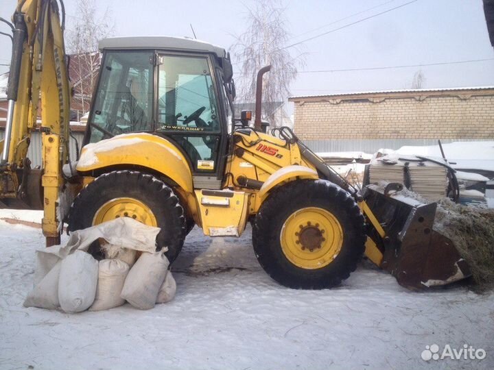 Экскаватор-погрузчик