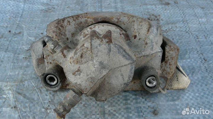 Суппорт тормозной пер левый Renault Duster I