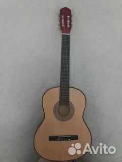 Классическая гитара для левши