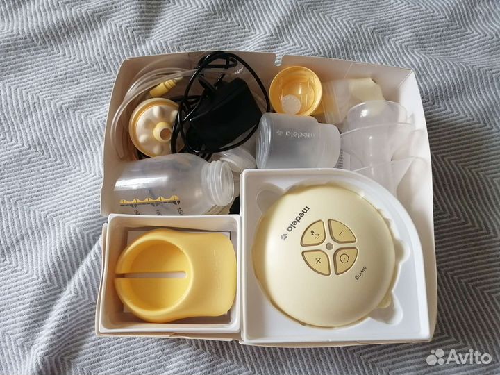 Молокоотсос medela swing электрический