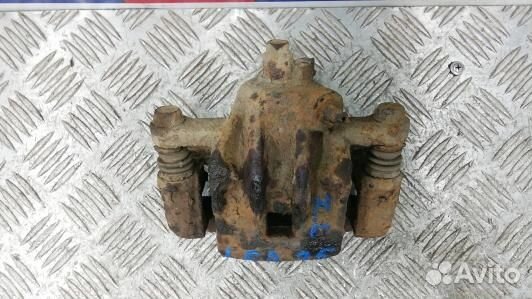 Суппорт тормозной задний левый hyundai tucson JM