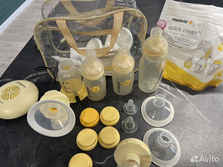 Молокоотсос medela swing maxi flex