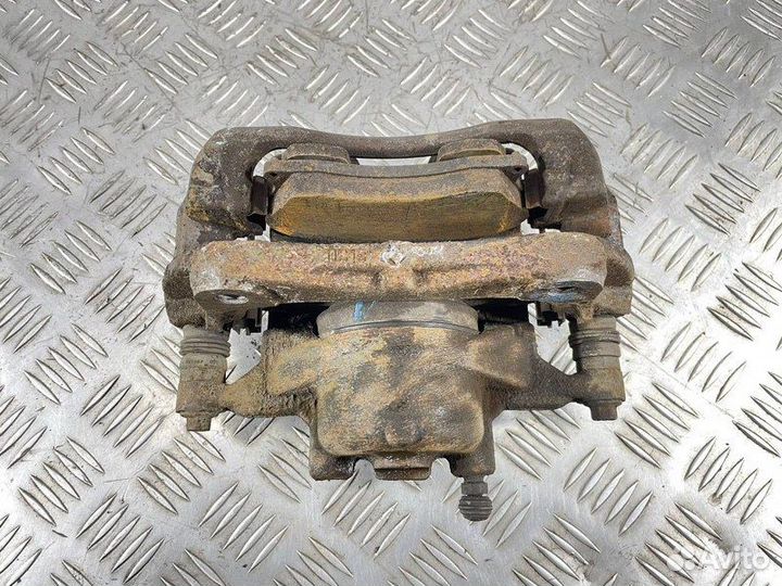 Суппорт тормозной передний левый Opel Astra J