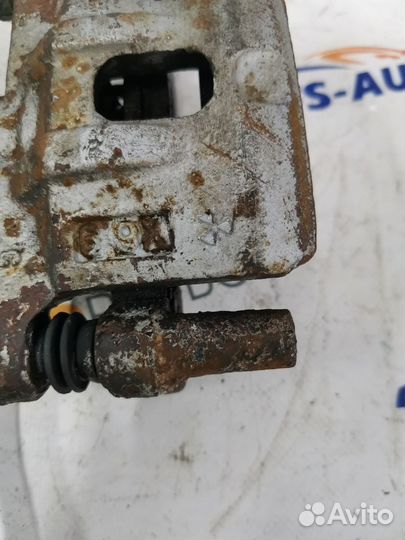 Задние тормозные суппорта Митсубиси Лансер 9