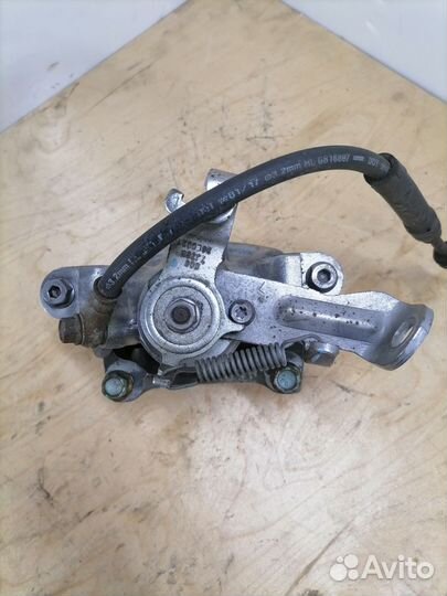 Задний левый тормозной суппорт Мазда 3 BM