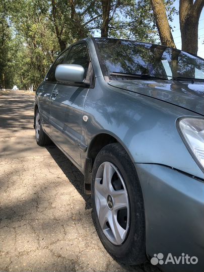 Mitsubishi Lancer 1.6 МТ, 2006, 200 000 км
