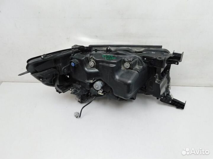 Фара левая Toyota Land Cruiser