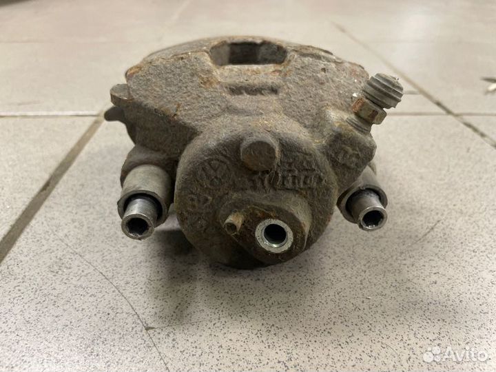 Суппорт тормозной передний правый Volkswagen Polo