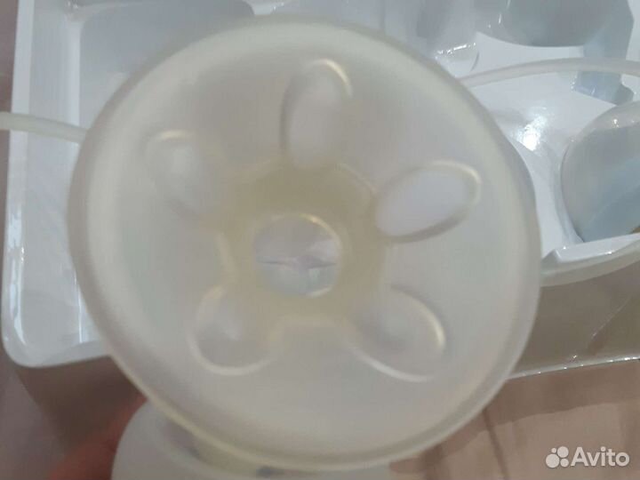 Молокоотсос электрический