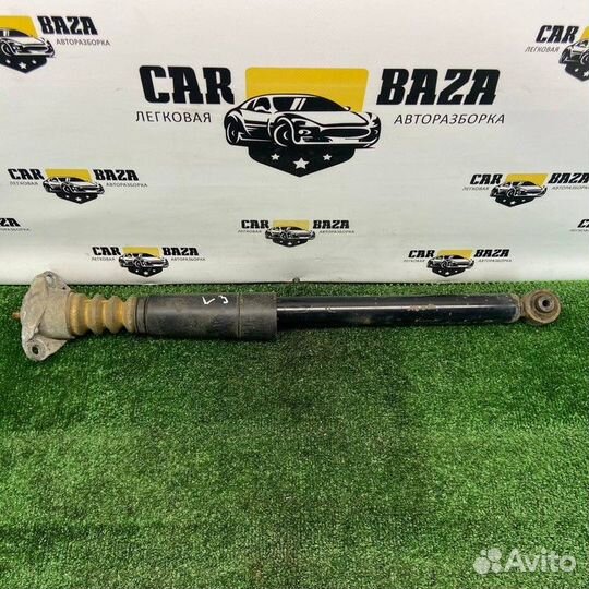 Амортизатор задний левый