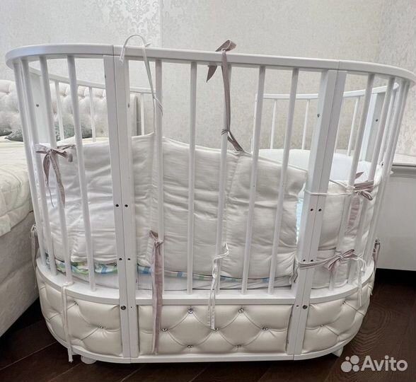 Детская овальная кроватка с маятником