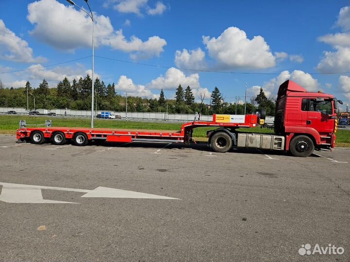 Низкорамный грузовой трал перевозка спец техники