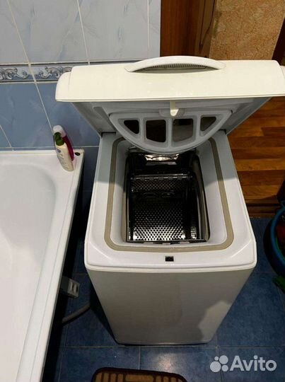 Стиральная машина с вертикальной загрузкой