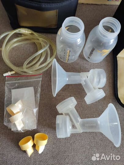 Молокоотсос medela электрический