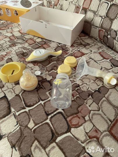 Молокоотсос medela ручной