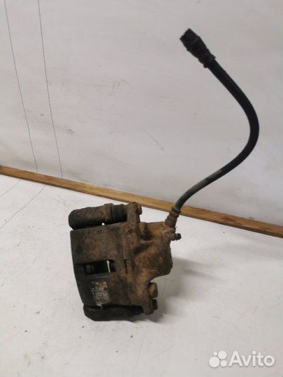 Суппорт тормозной передний правый Renault Logan 1