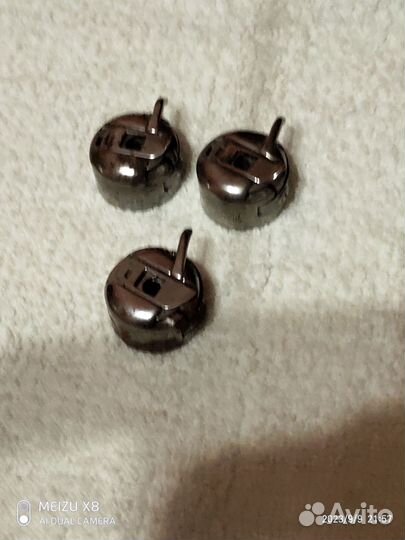 Шпульный колпачок