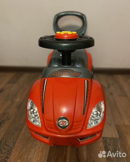 Машинка каталка толокар