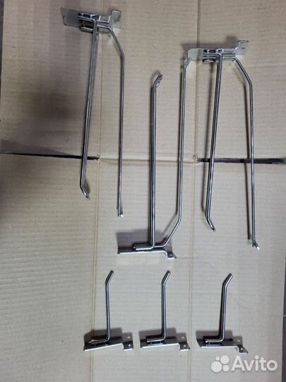 Крючки и ограничители для торговых стеллажей