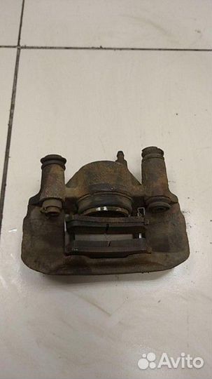 Суппорт передний правый Kia Rio, Mazda Demio