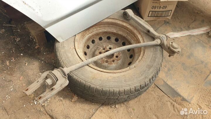 Лада Калина левый рычаг растяжка краб