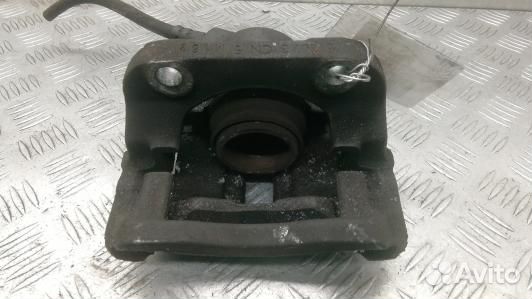 Суппорт тормозной передний левый dacia sandero 1