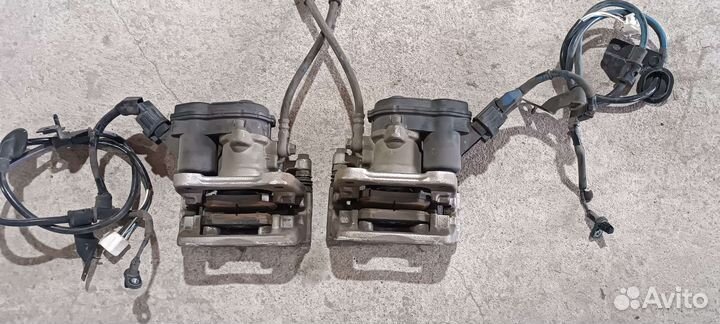 Суппорта задние левый правый Mazda 6GJ.Оригинал