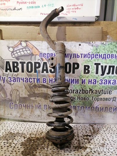 Стойка амортизатора переднего правого Mazda Xedos