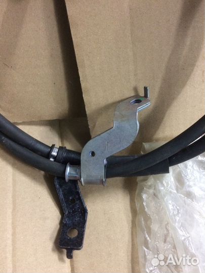 Трос ручного тормоза левый