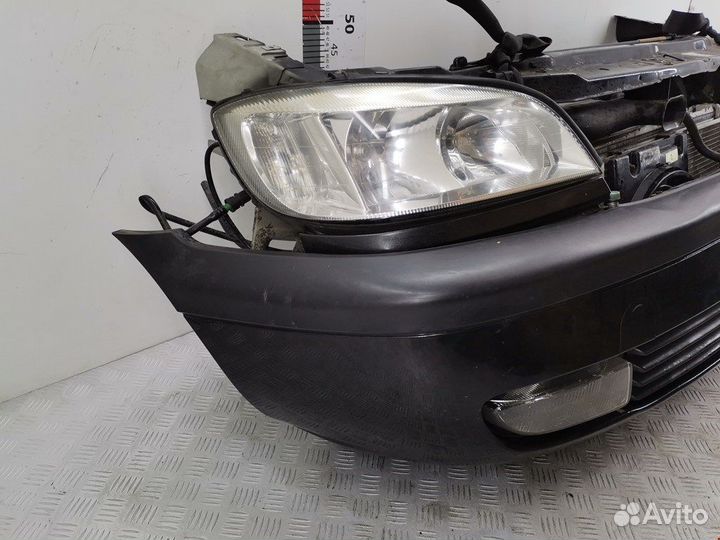 Бампер (ноускат) для Opel Zafira A R0B2F11K1V1