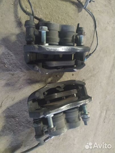 Суппорт тормозной передний Мерседес Спринтер 906