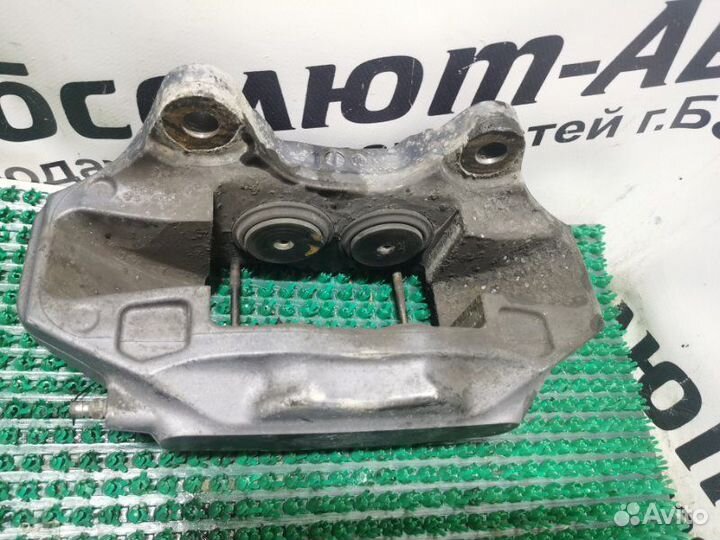 Суппорт тормозной передний левый Volkswagen