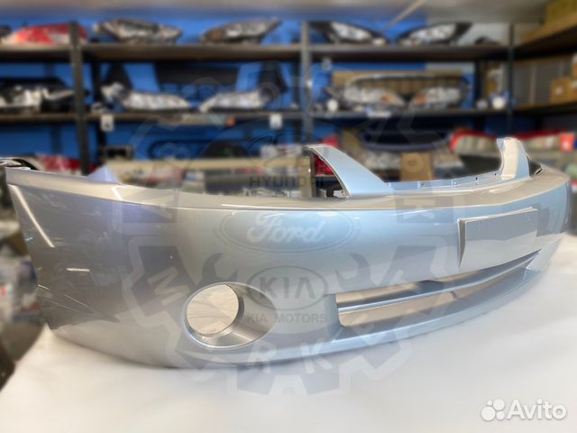 Бампер передний KIA Spectra серебристый