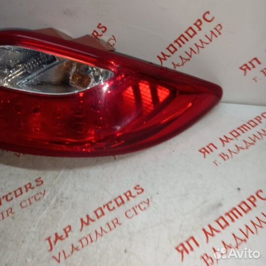 Фонарь задний задний правый Mazda 2 ZJ 2010