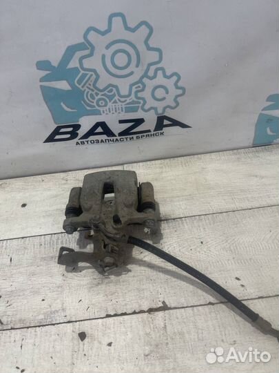 Суппорт задний левый Kia Cerato 3