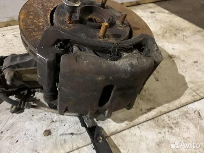 Суппорт передний левый dodge Grand Caravan 2001-2