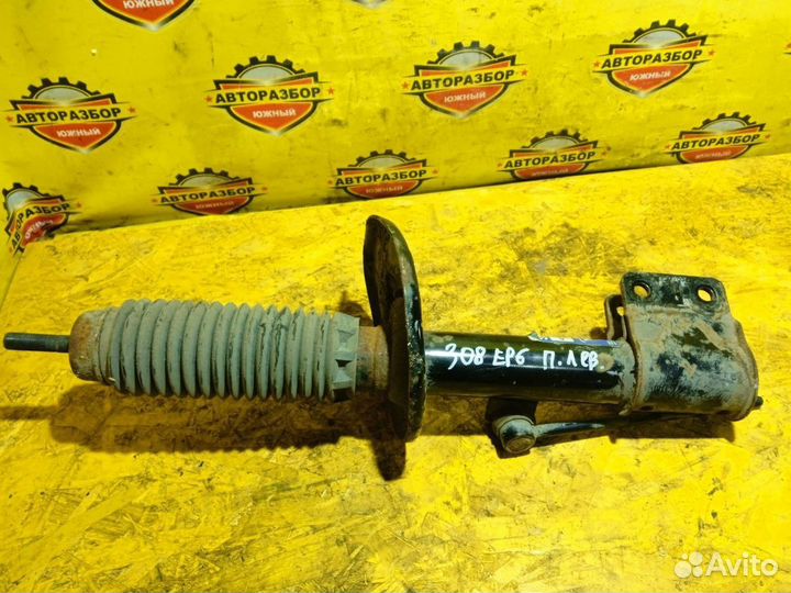 Амортизатор передний левый Peugeot 308