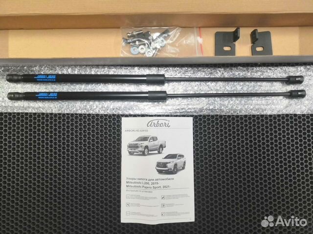 Амортизатор капота L200, Pajero Sport