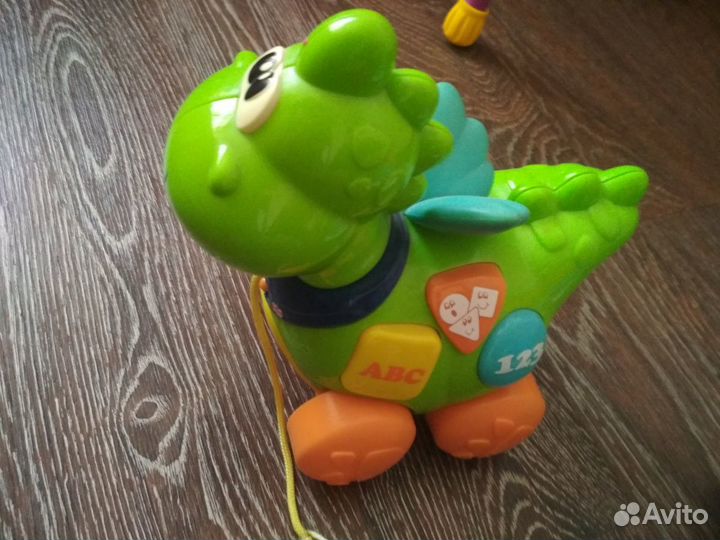 Динозаврик Chicco (русский и английский языки)