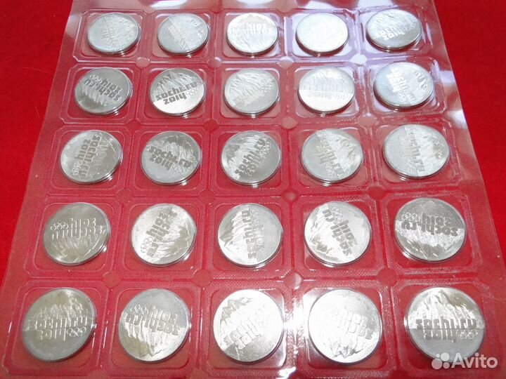 Олимпийские монеты: горы, звери, факел, лучик и сн