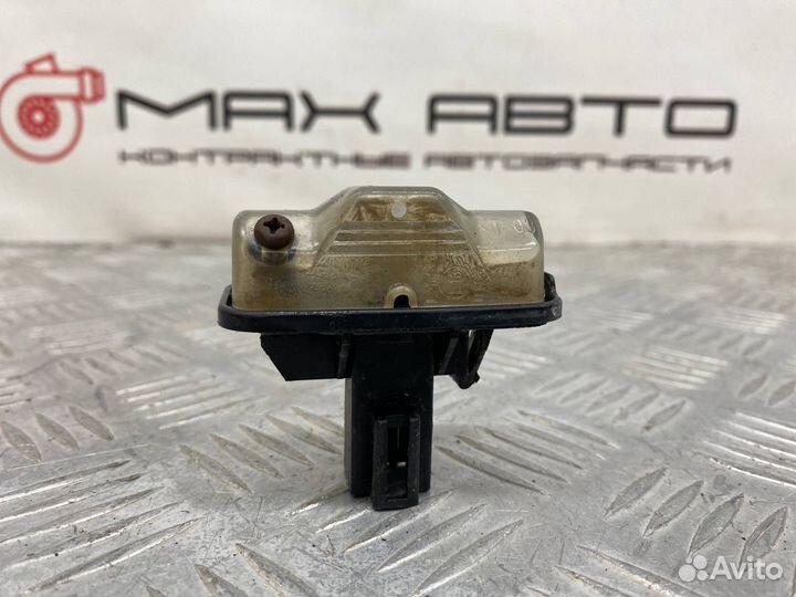 Б/У подсветка номера Toyota Duet M110A ejde 1Л