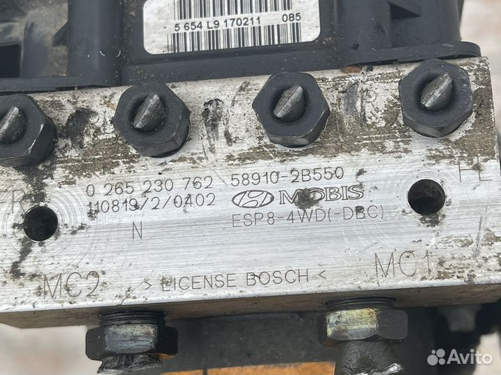 Блок abs Hyundai Santa Fe 2 CM