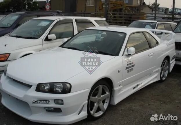 Передний бампер C-West Nissan Skyline R34