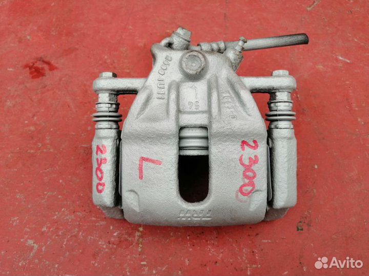 Суппорт передний левый Nissan Micra K12E 2002-2010