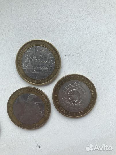 Монеты города