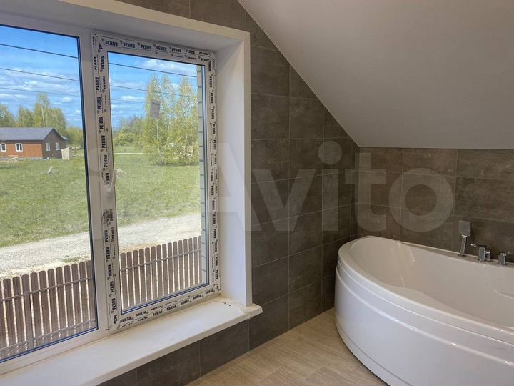 Коттедж 111 м² на участке 7,5 сот.