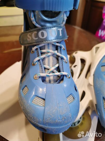 Роликовые коньки