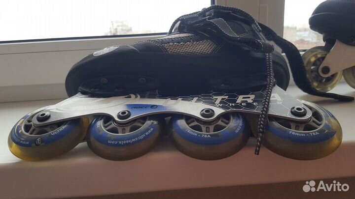 Роликовый коньки