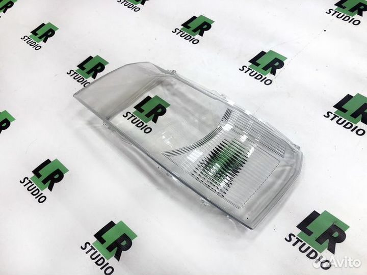 Стекло фары Freelander 2006-2010 левое