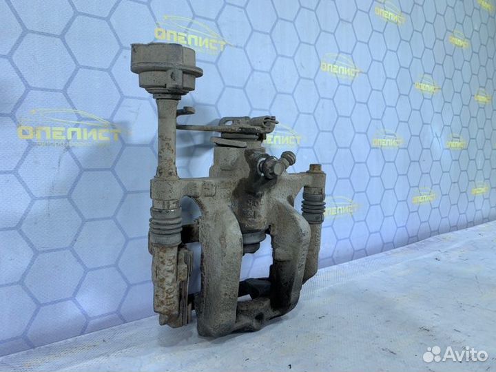 Суппорт тормозной задний правый Opel Astra J